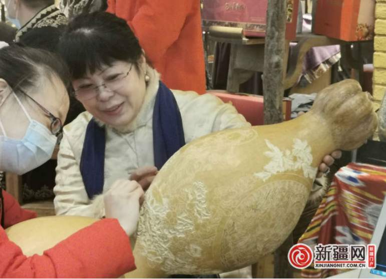 新疆积极做热“天山南北贺新春”